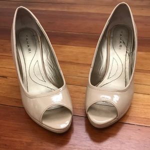 Gently worn, patent leather nude, peep toe wedges